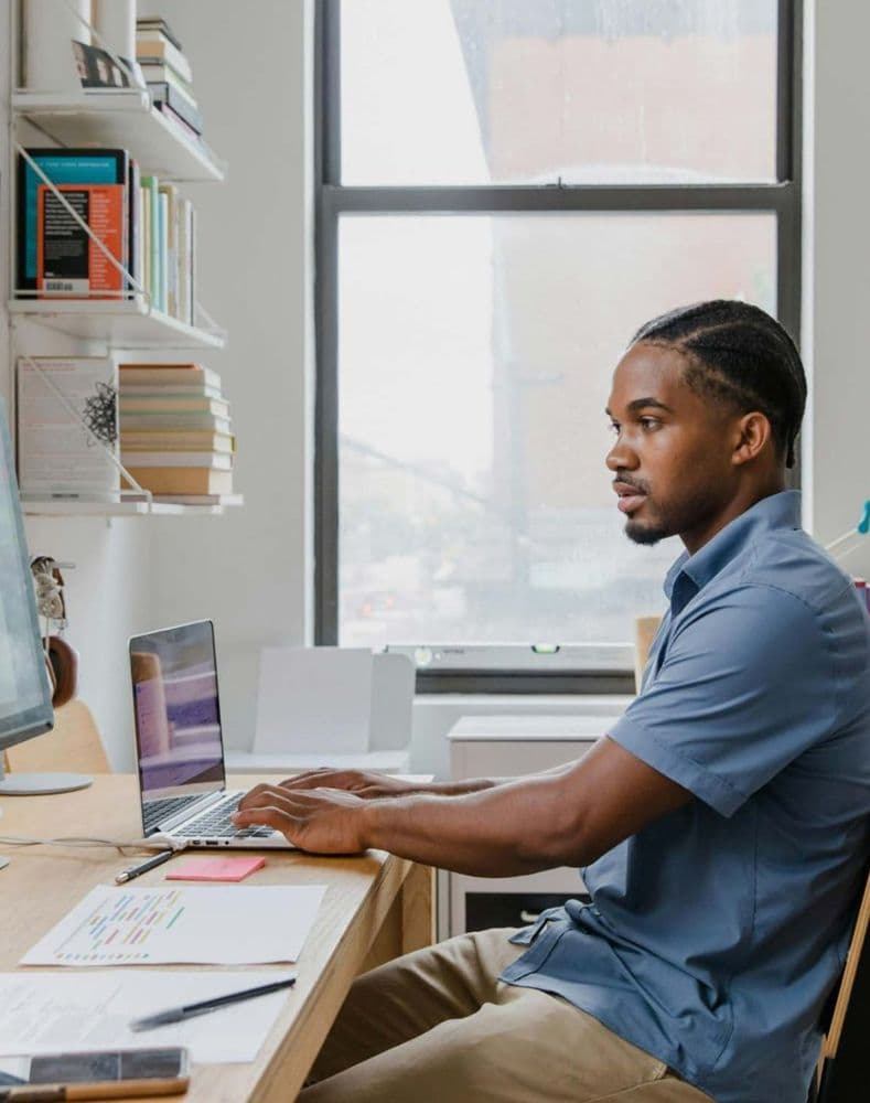 A data protection officer working at a desk