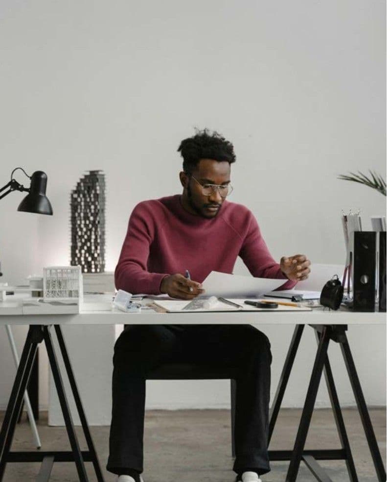 A consultant reviewing documents